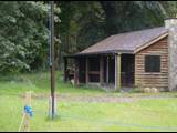 Jim Pike Cabin & flagpole
